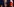 Der türkische Präsident Erdogan gestikuliert bei einer Rede, im Hintergrund die türkische Flagge