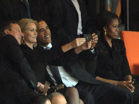 1310723465-barack-obama-michelle-selfie-12v0dfzNZR09.jpg